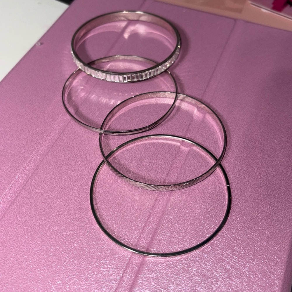 Thin metal bangles, silver color